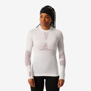 Koszulka termoaktywna narciarska damska Wedze BL900 wool seamless. Koszule nocne WED'ZE, bez wzorów, z elastanu, bez ramiączek. Za 229,99 zł.