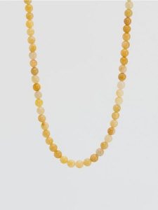 Naszyjnik z kamieniami - jasnożółty. Żółte naszyjniki Reserved. Za 69,99 zł.