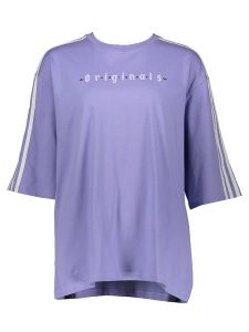 Adidas Koszulka "Oversized" w kolorze fioletowym rozmiar: S. Różowe bluzki ADIDAS, s, bez wzorów, z bawełny, bez kołnierzyka, bez ramiączek. Za 105,38 zł.