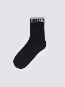 Skarpety damskie długie czarne Bordi 906. Czarne skarpetki Big Star, bez wzorów, z bawełny. Za 19,99 zł.