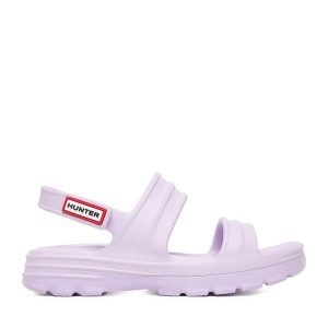 Sandały Hunter. Fioletowe sandały Hunter, bez wzorów, bez obcasa, na płaskiej podeszwie, bez zapięcia. Za 139,99 zł.