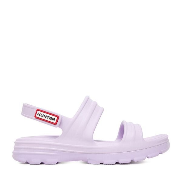 Sandały Hunter. Fioletowe sandały Hunter, bez wzorów, bez obcasa, na płaskiej podeszwie, bez zapięcia. Za 139,99 zł.