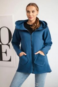 Bluza ocieplana z dłuższym tyłem i kieszeniami jeans. Bluzy KESI, l, bez wzorów, z bawełny, bez kaptura. Za 198,65 zł.