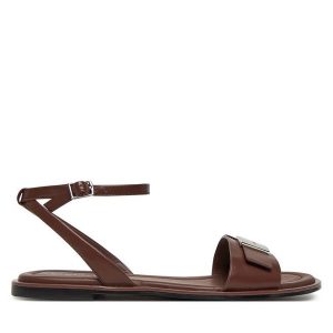 Sandały Calvin Klein. Brązowe sandały Calvin Klein, bez wzorów, bez obcasa, na płaskiej podeszwie, bez zapięcia. Za 279,99 zł.