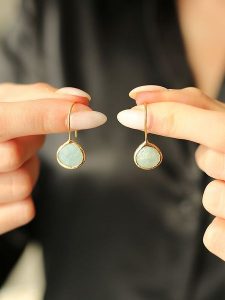 Pierres de Jade Pozłacane kolczyki z amazonitem rozmiar: onesize. Żółte kolczyki Pierres de Jade, pozłacane. Za 83,81 zł.