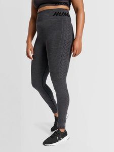 Damskie legginsy ze średnim stanem Hummel TE Curve. Czarne legginsy Hummel, bez wzorów, z dzianiny. Za 208,45 zł.