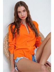 Trend Alacati Bluzka w kolorze pomarańczowym rozmiar: 36. Pomarańczowe bluzki Trend Alacati, bez wzorów, z bawełny, bez kołnierzyka, bez ramiączek. Za 57,45 zł.