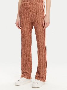 Lacoste Spodnie dresowe XF9313 Pomarańczowy Regular Fit. Brązowe spodnie dresowe Lacoste, bez wzorów, z dresówki. Za 459,99 zł.