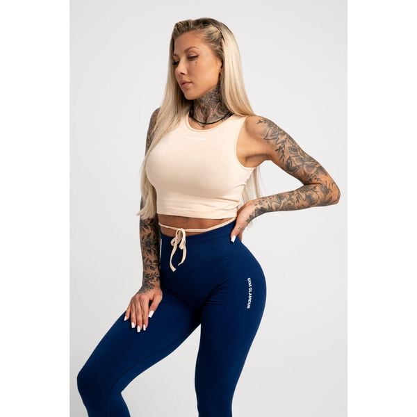 Top fitness damski Gym Glamour wiązany. Brązowe topy GYM GLAMOUR, l, bez wzorów, glamour, bez kołnierzyka, bez ramiączek. Za 99,99 zł.