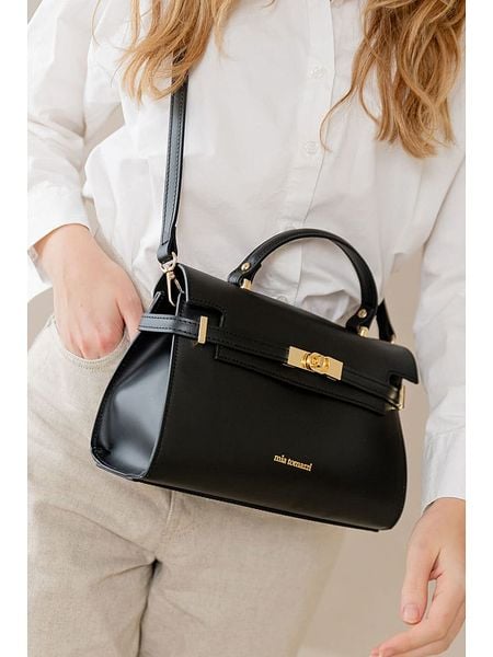 Mia Tomazzi Torebka "Tazzoli" w kolorze czarnym - 27 x 19 x 11 cm rozmiar: onesize. Czarne torebki klasyczne Mia Tomazzi, bez wzorów, z materiału, przez ramię, bez dodatków. Za 392,52 zł.