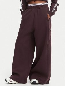 Reebok Spodnie dresowe Aleksandra RK25682CCW Brązowy ciemny Regular Fit. Brązowe spodnie dresowe Reebok, l, bez wzorów, z bawełny. Za 259,99 zł.