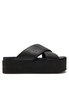 Calvin Klein Jeans Klapki Flatform Cross Mg Uc YW0YW01349 Czarny. Czarne klapki Calvin Klein Jeans, bez wzorów, z jeansu, bez obcasa. Za 219,99 zł.