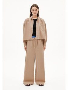 Armedangels Spodnie "Kelaani" w kolorze jasnobrązowym rozmiar: M. Brązowe spodnie z wysokim stanem ARMEDANGELS, bez wzorów, z bawełny, z podwyższonym stanem. Za 243,84 zł.