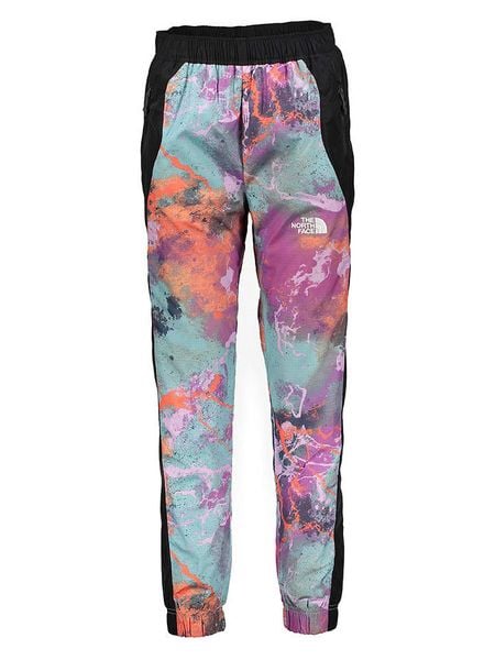 The North Face Spodnie funkcyjne w kolorze czarno-turkusowo-fioletowym rozmiar: L. Czarne spodnie dresowe The North Face, l, bez wzorów, outdoorowe. Za 277,36 zł.