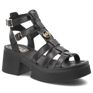 Czarne Sandały Karino Buty Damskie Zapinane Na Sprzączkę. Czarne sandały Karino, bez wzorów, ze skóry, bez obcasa, na obcasie, bez zapięcia. Za 459,00 zł.