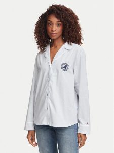 Tommy Hilfiger Koszula UW0UW05764 Niebieski jasny Regular Fit. Niebieskie koszule TOMMY HILFIGER, s, bez wzorów, z bawełny, bez kołnierzyka, bez ramiączek. Za 249,99 zł.