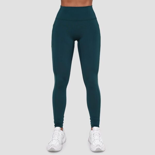 Legginsy damskie fitness z kieszeniami ciemnozielone Ignite. Zielone legginsy GYMBEAM, bez wzorów, z elastanu. Za 115,90 zł.