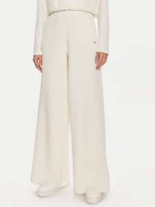Guess Spodnie dresowe Olympe V4YB07 KCAY2 Beżowy Relaxed Fit. Brązowe spodnie dresowe Guess, m, z aplikacjami, z dresówki. Za 269,99 zł.