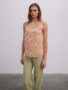 BGN Top w kolorze kremowo-różowym rozmiar: 34. Brązowe topy BGN, bez wzorów, bez kołnierzyka, bez ramiączek. Za 43,99 zł.