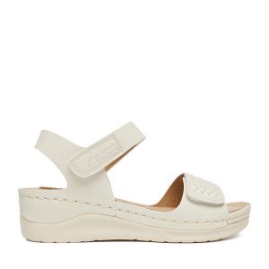 Sandały Go Soft. Białe sandały Go Soft, bez wzorów, bez obcasa, na koturnie, bez zapięcia. Za 119,99 zł.