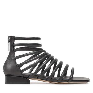 Sandały GINO ROSSI. Czarne sandały Gino Rossi, bez wzorów, bez obcasa, na płaskiej podeszwie, bez zapięcia. Za 299,99 zł.