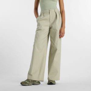Spodnie damskie New Balance WP51538OVN – beżowe. Brązowe spodnie z wysokim stanem New Balance, bez wzorów, z bawełny, z podwyższonym stanem. Za 359,99 zł.