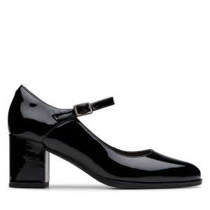 Półbuty Clarks. Czarne czółenka Clarks, bez wzorów, bez obcasa, na obcasie, bez zapięcia. Za 249,99 zł.