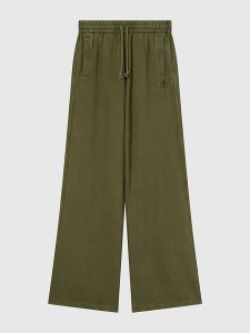 Champion Spodnie dresowe w kolorze khaki rozmiar: XS. Brązowe spodnie dresowe Champion, xs, bez wzorów, z bawełny. Za 123,25 zł.