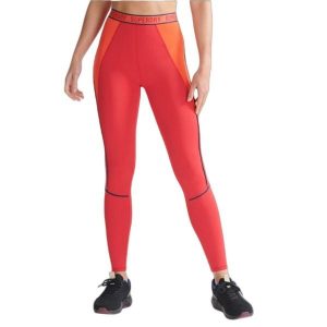 Legginsy sportowe damskie Superdry Train Branded Elastic Tight. Czerwone legginsy Superdry, bez wzorów, z elastanu. W wyprzedaży za 115,00 zł.