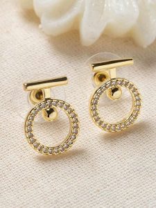 Lodie Silver Pozłacane kolczyki-wkrętki z cyrkoniami rozmiar: onesize. Szare kolczyki Lodie Silver, z cyrkonią, metalowe. Za 73,99 zł.