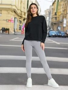 Legginsy z wysokim stanem - szary. Szare legginsy Sinsay, bez wzorów, z materiału, z podwyższonym stanem. Za 12,99 zł.