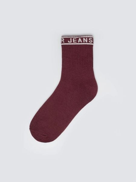 Skarpety damskie długie bordowe Bordi 604. Czerwone skarpetki Big Star, bez wzorów, z bawełny. Za 19,99 zł.