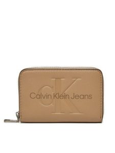 Calvin Klein Jeans Portfel Zip Around Mono K60K612255 Beżowy. Brązowe portfele Calvin Klein Jeans, bez wzorów, z jeansu. Za 139,99 zł.