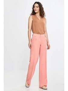 Nife Spodnie w kolorze łososiowym rozmiar: 38. Pomarańczowe spodnie z wysokim stanem Nife, bez wzorów, z materiału, z podwyższonym stanem. Za 122,38 zł.