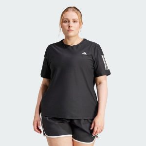 Koszulka Own The Run (Plus Size). Czarne bluzki ADIDAS, m, bez wzorów, z materiału, sportowe, bez kołnierzyka, plus size, bez ramiączek. W wyprzedaży za 104,30 zł.