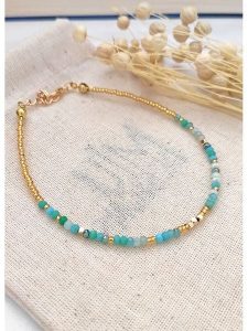 Atelier MIU Bransoletka z turkusami na kostkę - dł. 21 cm rozmiar: onesize. Bransoletki Atelier MIU, z turkusem, z mosiądzu. Za 30,99 zł.