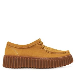 Półbuty Clarks. Żółte półbuty Clarks, bez wzorów, bez obcasa, na płaskiej podeszwie, bez zapięcia. Za 269,99 zł.