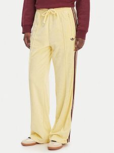 Adidas Spodnie dresowe Terry Towel Firebird KQ6662 Żółty Loose Fit. Żółte spodnie dresowe ADIDAS, l, bez wzorów, z bawełny. Za 348,99 zł.