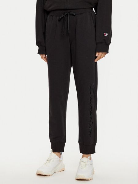 Champion Spodnie dresowe 117584 Czarny Slim Fit. Czarne spodnie dresowe Champion, s, bez wzorów, z bawełny. Za 119,99 zł.