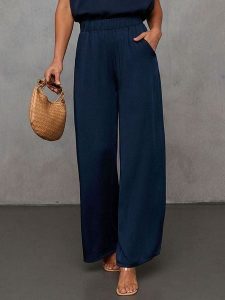 LA Angels Spodnie w kolorze granatowym rozmiar: XL. Niebieskie spodnie z wysokim stanem LA Angels, bez wzorów, z materiału, z podwyższonym stanem. Za 122,67 zł.