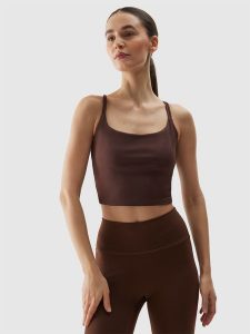 4F Crop top do jogi i pilatesu z materiału z recyklingu damski - brązowy L. Brązowe topy 4f, l, bez wzorów, z dzianiny, bez kołnierzyka, bez ramiączek. W wyprzedaży za 49,99 zł.