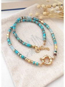 Atelier MIU Pozłacany naszyjnik z turkusami - dł. 45 cm rozmiar: onesize. Niebieskie naszyjniki Atelier MIU, z turkusem, pozłacane. Za 56,99 zł.