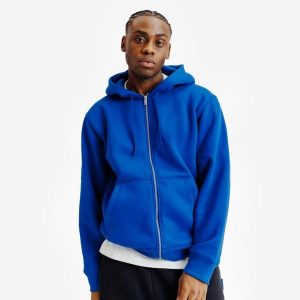 Bluza na suwak unisex Elementals. Niebieskie bluzy DECATHLON, l, bez wzorów, z bawełny, z kapturem. W wyprzedaży za 119,99 zł.