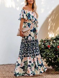 Milan Kiss Sukienka ze wzorem rozmiar: XL. Niebieskie sukienki Milan Kiss, na imprezę, xl, bez wzorów, z tkaniny, bez kołnierzyka, bez ramiączek, maxi. Za 139,87 zł.