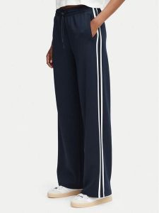 Guess Spodnie dresowe V6YB08 K4286 Granatowy Regular Fit. Niebieskie spodnie dresowe Guess, xl, z aplikacjami, z dresówki. Za 434,99 zł.