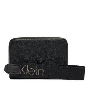 Portfel Calvin Klein Jeans. Czarne portfele Calvin Klein Jeans, bez wzorów, z jeansu. Za 219,99 zł.