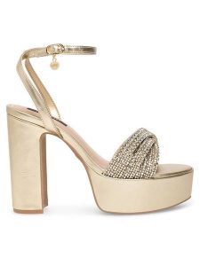 Nine West Sandały WFA2736-1 Złoty. Żółte sandały Nine West, bez wzorów, z syntetyku, bez obcasa, na słupku, bez zapięcia. Za 155,99 zł.