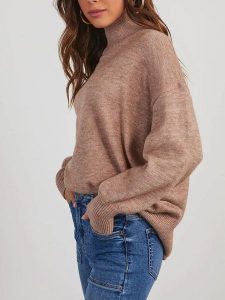 Milan Kiss Sweter w kolorze jasnobrązowym rozmiar: L. Brązowe swetry oversize Milan Kiss, l, bez wzorów, bez ramiączek. Za 130,99 zł.