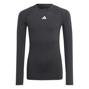 Koszulka adidas Tech Fit Jr. Czarna, dopasowana, z długim rękawem. Czarne koszule nocne ADIDAS, bez wzorów, z elastanu, bez ramiączek. Za 81,00 zł.
