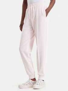 Guess Spodnie dresowe V6BB17 K6344 Różowy jasny Regular Fit. Czerwone spodnie dresowe Guess, xl, z aplikacjami, z dresówki. Za 344,99 zł.